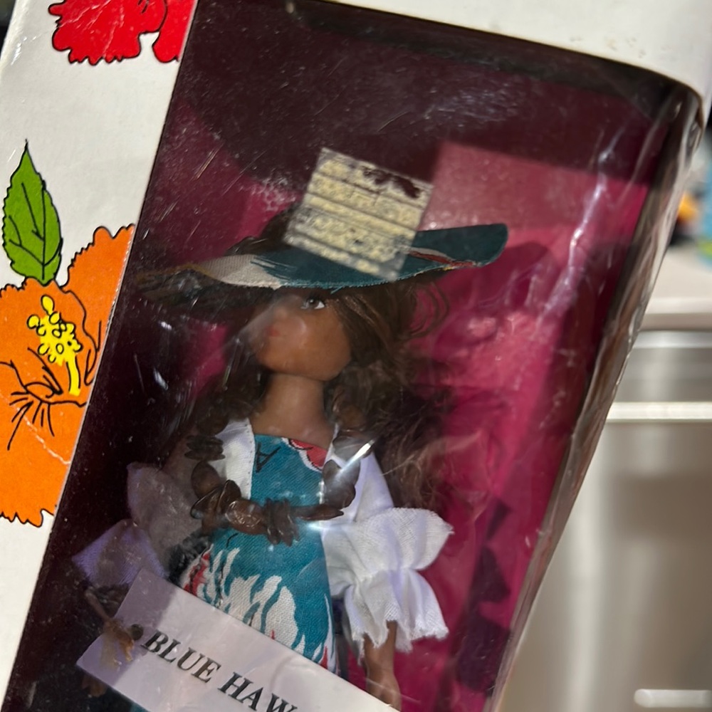 Revolving music doll blue Hawaii